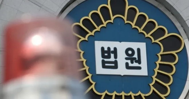 동료 추행 혐의 약식기소 70대…정식 재판서 무죄